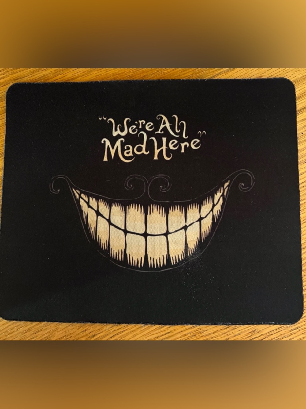 Black 'We're All Mad Here' Decorative Mouse Pad